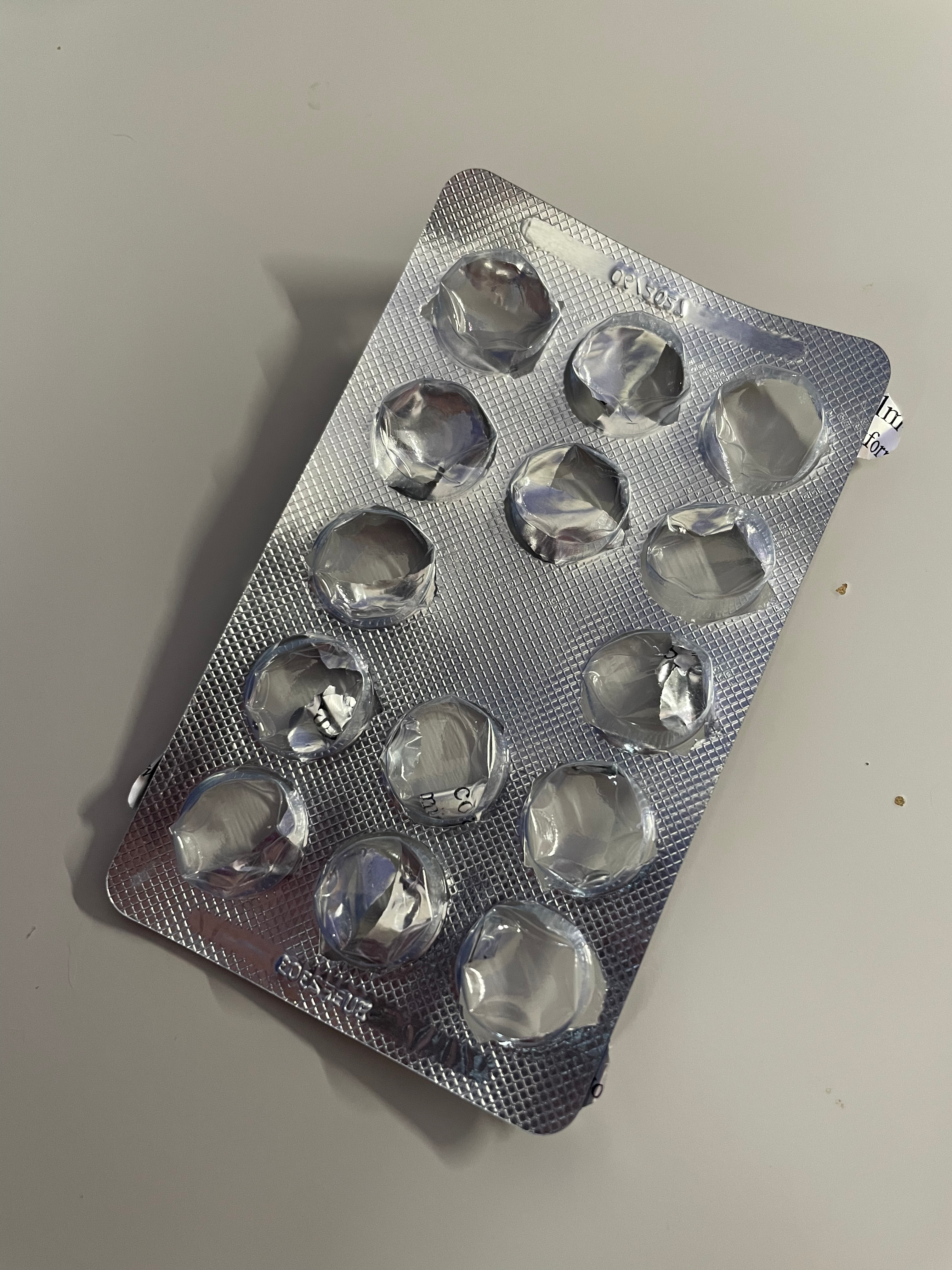 An empty strip of metformin tablets